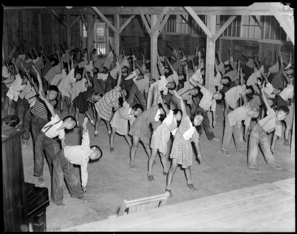 Jerome Relocation Center, Dermott, Arkansas. View of second graders doing their rythmic exercises i . . . - NARA - 537309