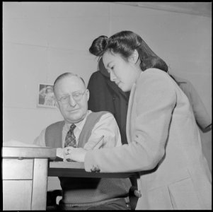 Jerome Relocation Center, Denson, Arkansas. Attorney Ulys A. Lovell, and his resident secretary, Mi . . - NARA - 539355
