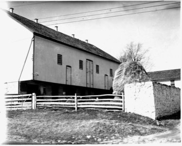 Lancaster County, Pennsylvania. A good example of the over-shot on a bank barn. Notice the manure . . . - NARA - 521133