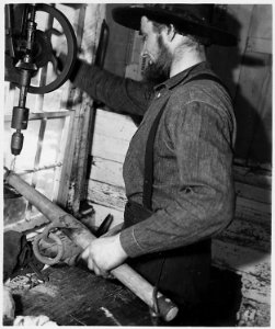 Lancaster County, Pennsylvania. An Old-Order Amishman working in his repair shop. Good machine sho . . . - NARA - 521078