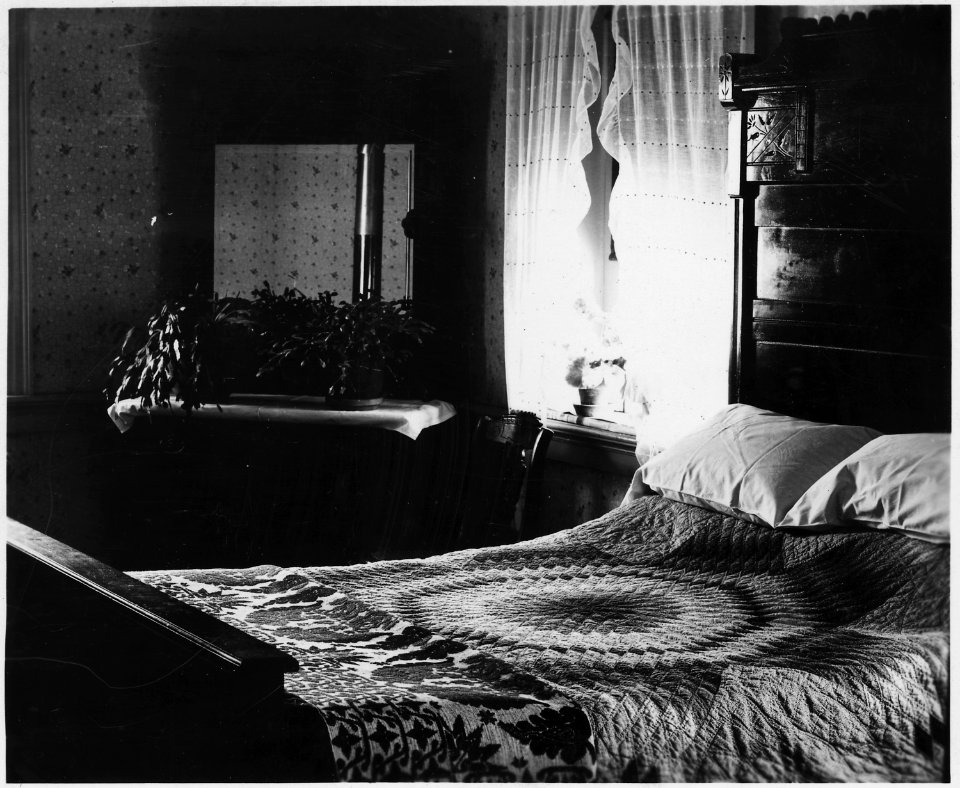 Lancaster County, Pennsylvania. This is a bedroom in a conservative Mennonite household. The bed a . . . - NARA - 521054