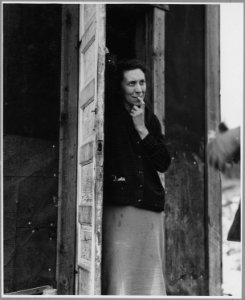 Landaff, Grafton County, New Hampshire. Mrs. Frank Malone in the doorway of her home. - NARA - 521482