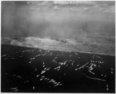 Landing craft brings first wave of invading Yanks to Iwo Jima. - NARA - 520956
