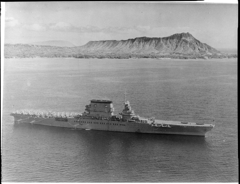 Lexington (CV2). Aerial, starboard beam. aircraft on deck. Diamond Head in background - NARA - 520762