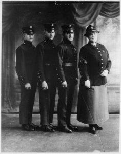 Lillian Russell shown as a U.S. Marine Corps Woman Reserve, with Privates O'Keefe, Kelly and Spike., ca. 1917 - ca. 1918 - NARA - 532574