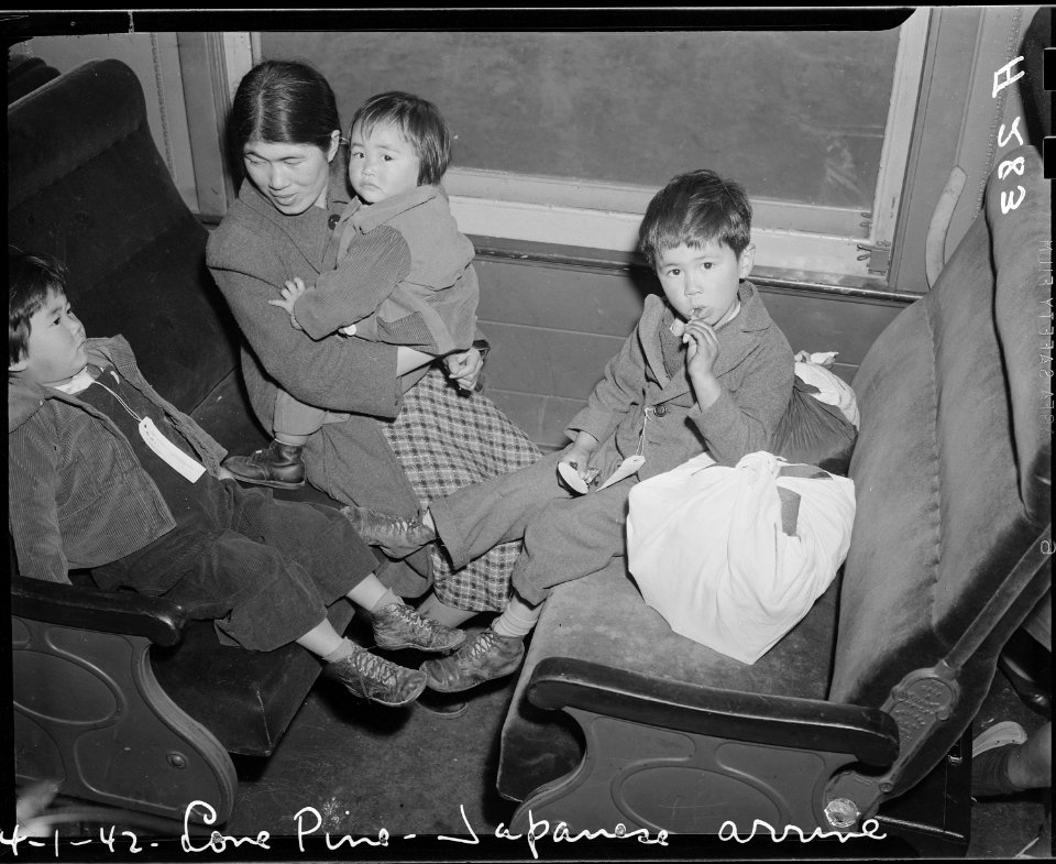 Lone Pine, California. Mother and child evacuees of Japanese ancestry on this train en route to the . . . - NARA - 536224