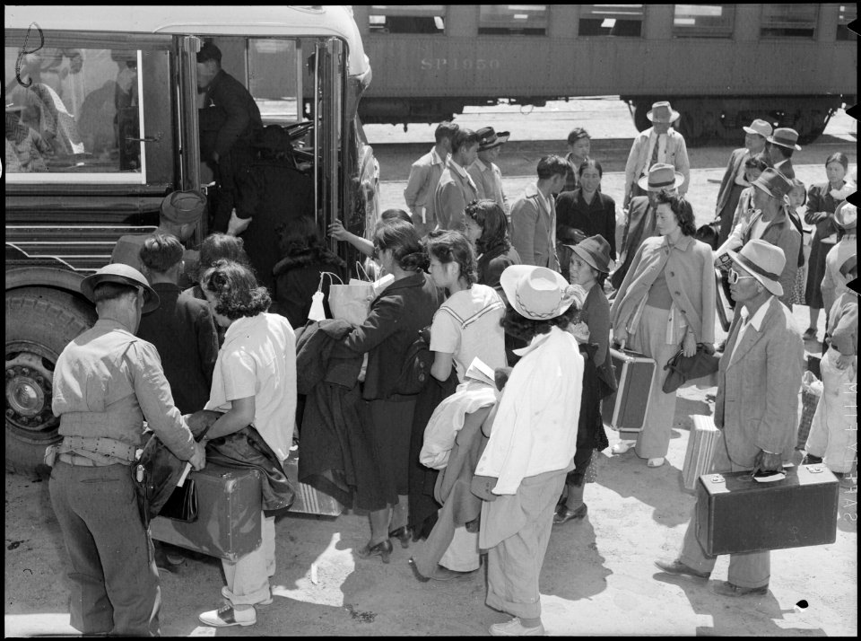 Lone Pine, California. This group arrived by train from Elk Grove, California and are boarding bus . . . - NARA - 538501