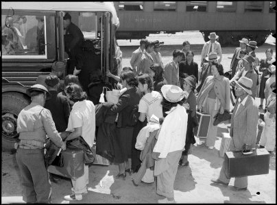 Lone Pine, California. This group arrived by train from Elk Grove, California and are boarding bus . . . - NARA - 538501