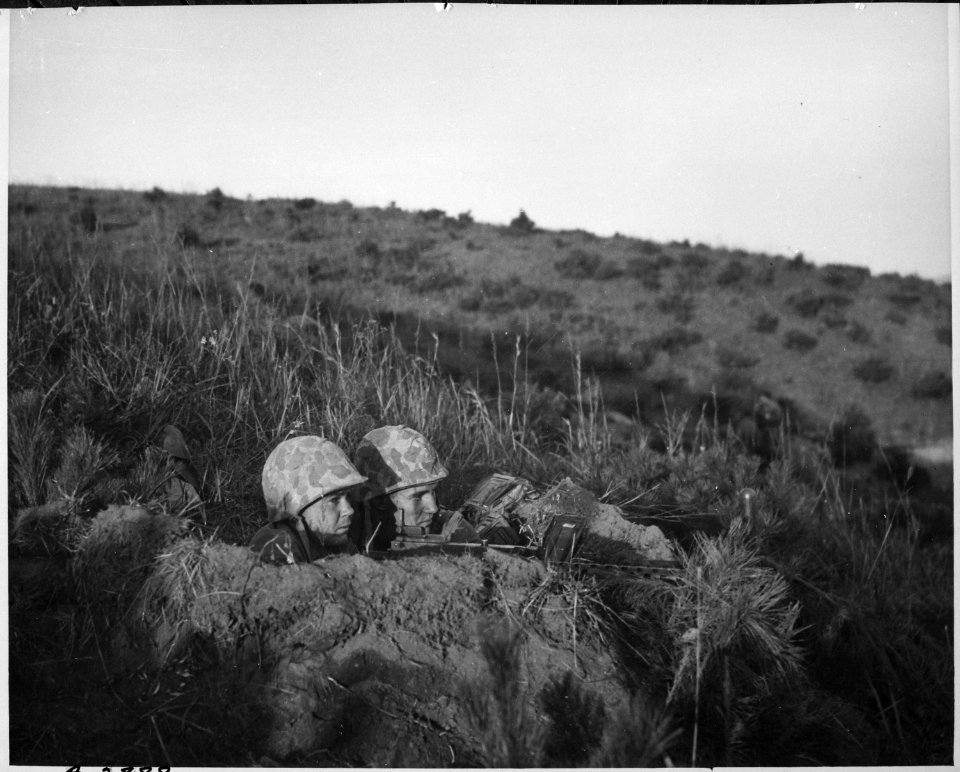 Leatherneck machine gun crew dug in for the night in Korea. - NARA - 532402