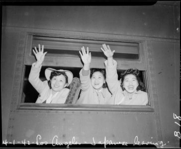 Los Angeles, California. Waving good-bye as the train pulls away from the station. These girls are . . . - NARA - 536767