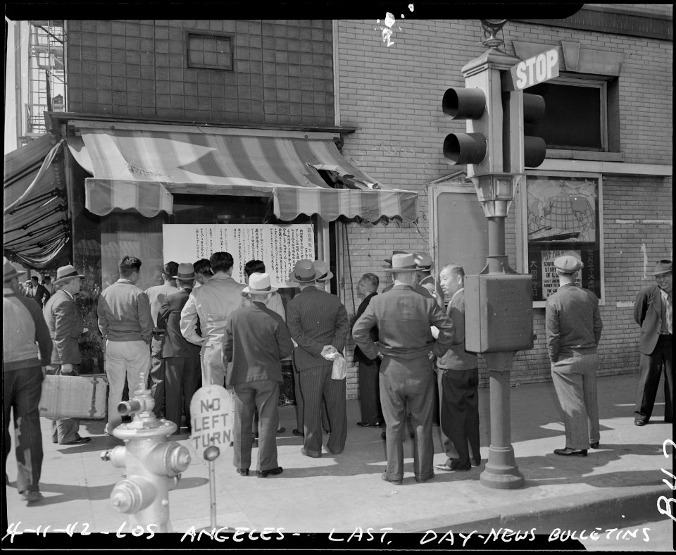 Los Angeles, California. The traffic sign says stop but the bulletin in Japanese says Go to res . . . - NARA - 536791