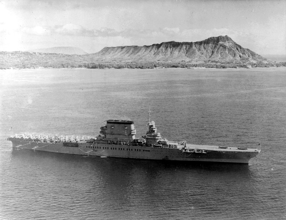 Lexington (CV2). Aerial, starboard beam. aircraft on deck. Diamond Head in background, 02-02-1933 - NARA - 520762