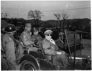 Lieutenant General Matthew Ridgway, Major General Doyle Hickey, and General Douglas MacArthur, Commander in Chief of... - NARA - 531405 photo
