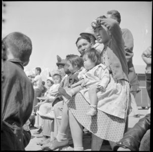 Manzanar Relocation Center, Manzanar, California. A group of evacuees watching a Memorial Day servi . . . - NARA - 538549