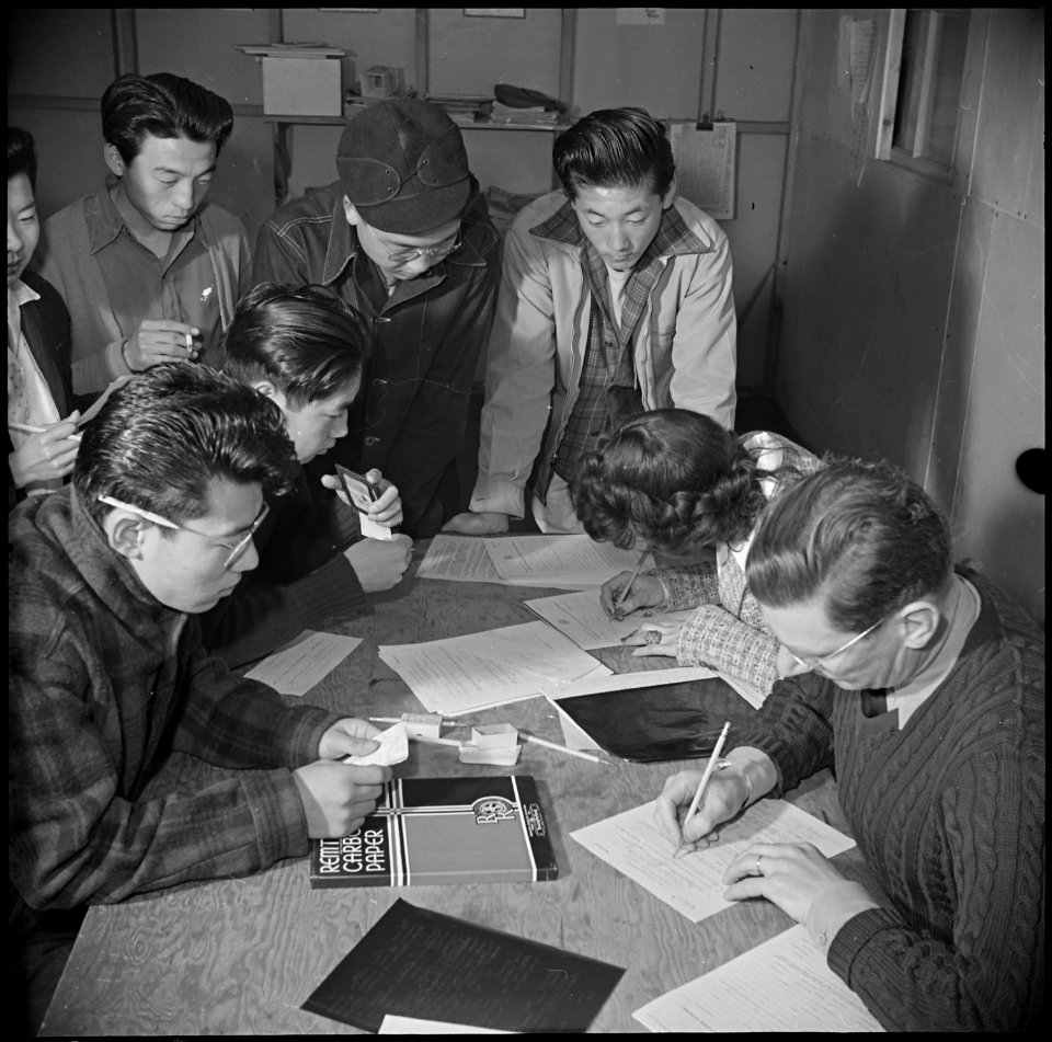 Manzanar Relocation Center, Manzanar, California. A view in the block manager's office, where evacu . . . - NARA - 536930