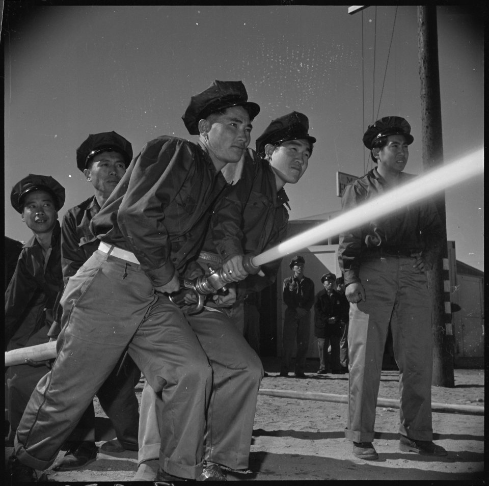 Manzanar Relocation Center, Manzanar, California. A practice fire drill gives the local fire depart . . . - NARA - 536949
