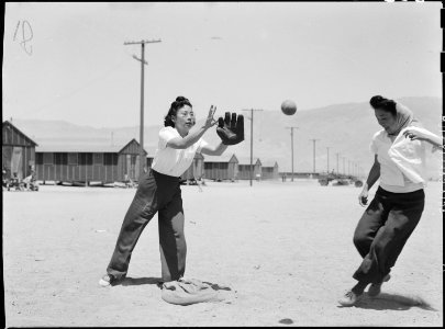 Manzanar Relocation Center, Manzanar, California. A close play at third base in a practice game bet . . . - NARA - 538497