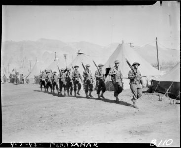 Manzanar Relocation Center, Manzanar, California. Army military police go on duty to guard the boun . . . - NARA - 536859