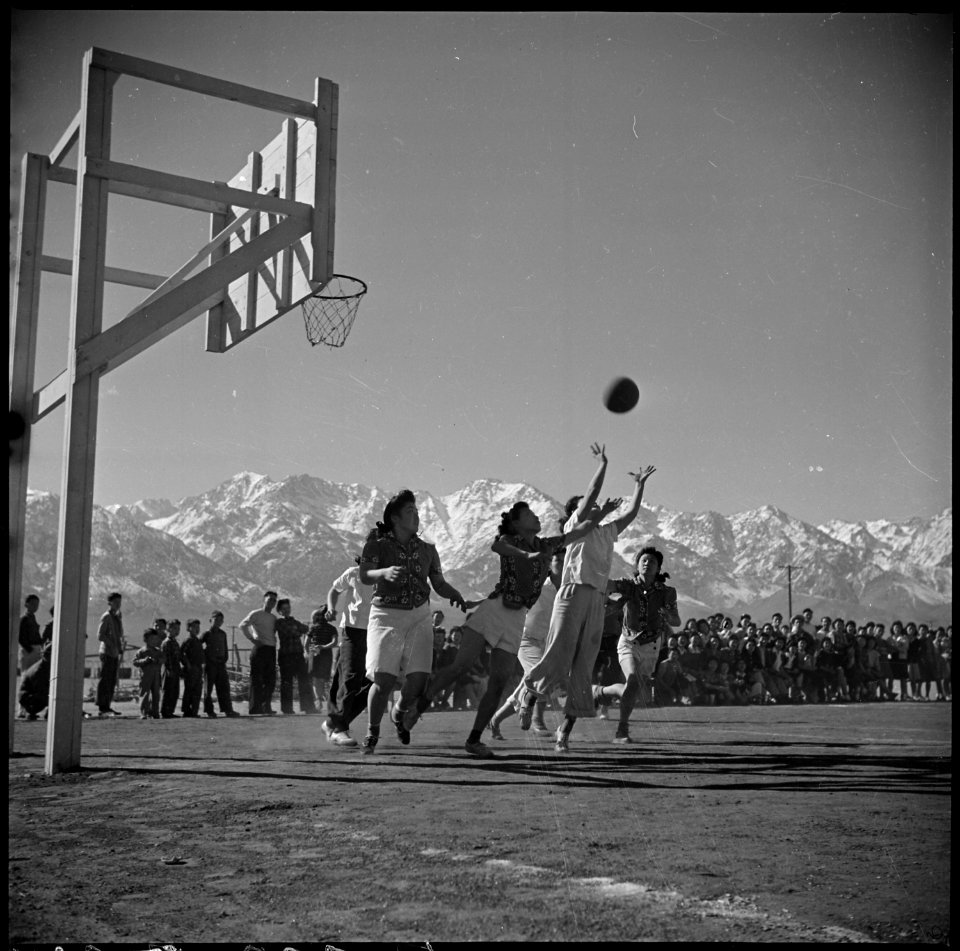 Manzanar Relocation Center, Manzanar, California. Basketball games are part of the regular schedule . . . - NARA - 536936