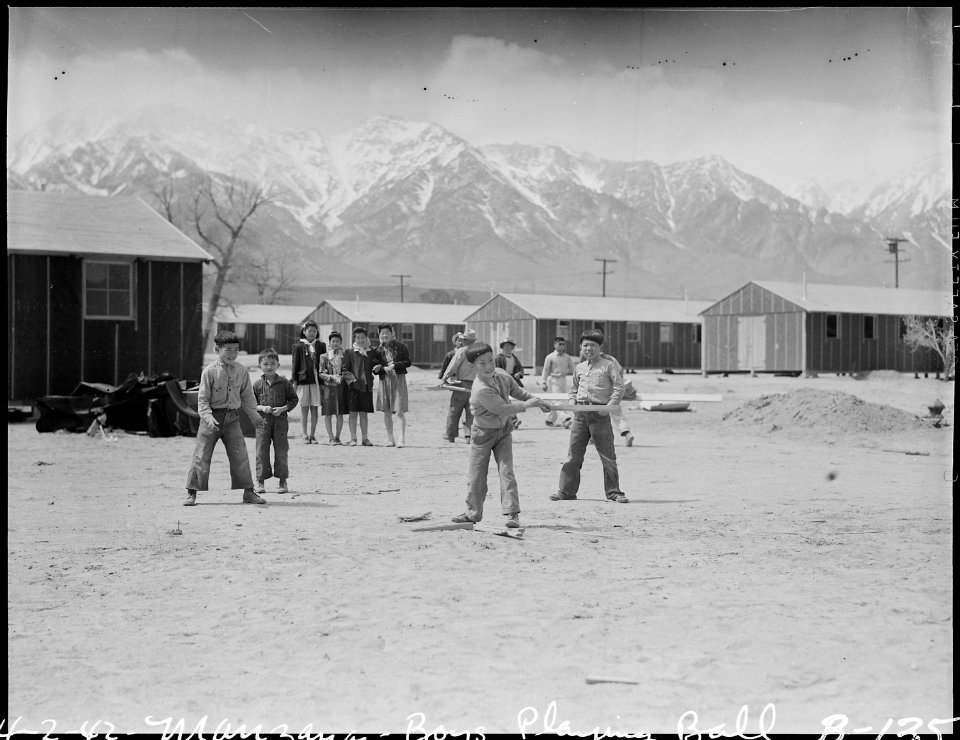 Manzanar Relocation Center, Manzanar, California. Boys start a ball game soon after their arrival a . . . - NARA - 536883