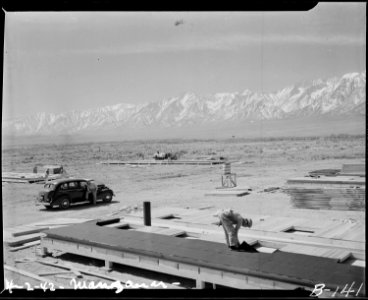 Manzanar Relocation Center, Manzanar, California. Construction begins at Manzanar, now a War Reloca . . . - NARA - 536889 photo