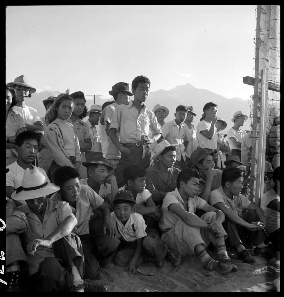 Manzanar Relocation Center, Manzanar, California. Evacuees of Japanese ancestry are enjoying a base . . . - NARA - 538069