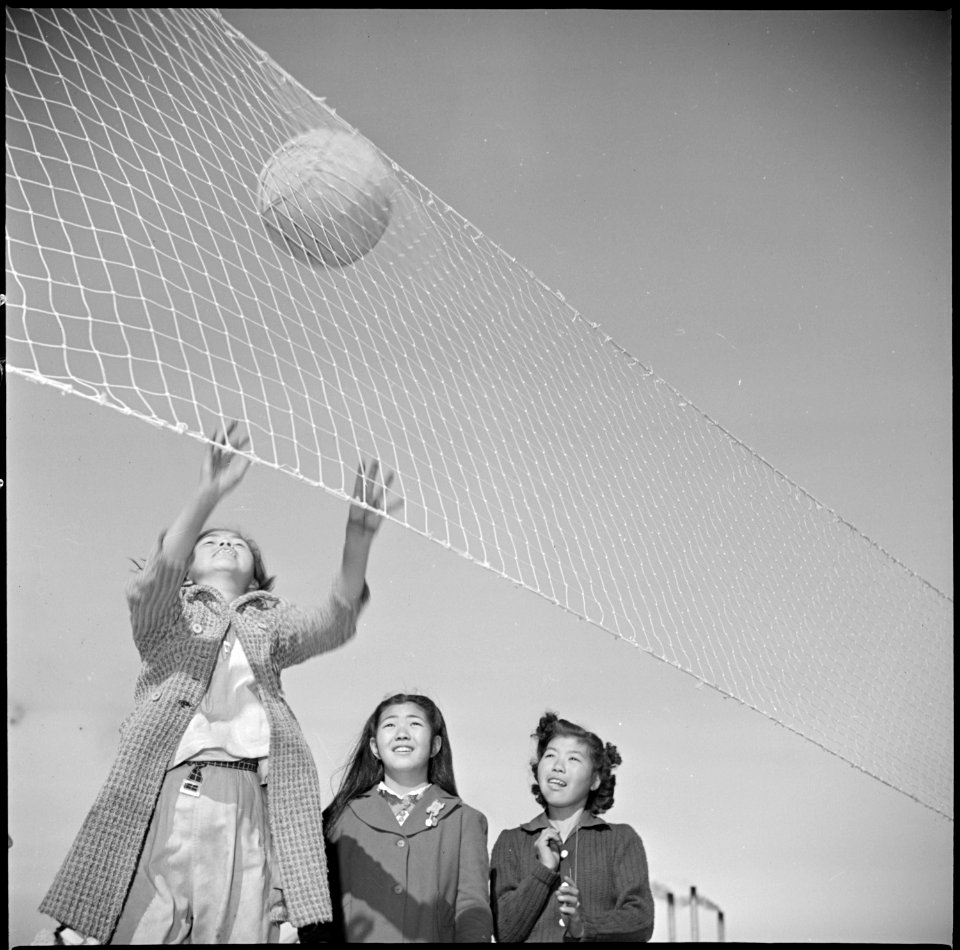 Manzanar Relocation Center, Manzanar, California. Girls from the sixth grade spend recess time in a . . . - NARA - 536701