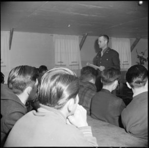 Manzanar Relocation Center, Manzanar, California. Lieutenant Eugene Bogard explains the purposes of . . . - NARA - 536710