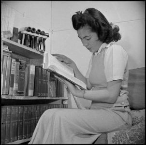 Manzanar Relocation Center, Manzanar, California. Lucy Yonemitshu, former student from Los Angeles, . . . - NARA - 536923