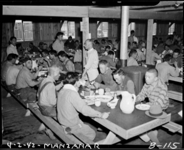 Manzanar Relocation Center, Manzanar, California. Mealtime at Manzanar, a War Relocation Authority . . . - NARA - 536863