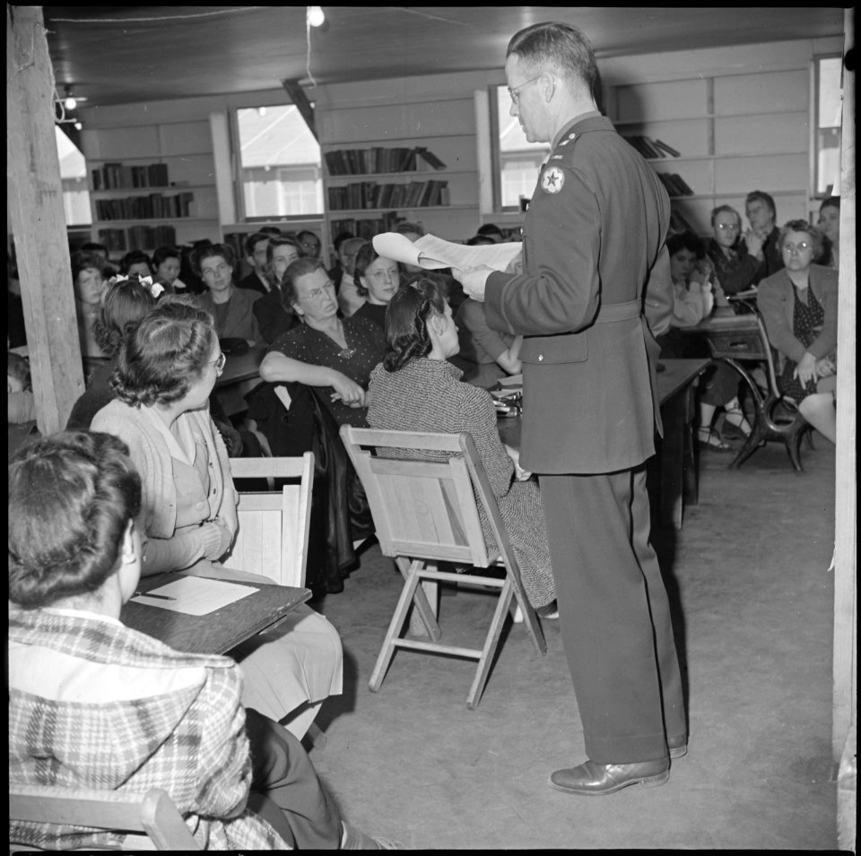 Manzanar Relocation Center, Manzanar, California. Lieutenant Eugene Bogard explains the method of r . . . - NARA - 536720