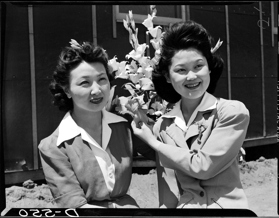 Manzanar Relocation Center, Manzanar, California. Nancy Kawashima (left), and Emiko Hino, both from . . . - NARA - 538518