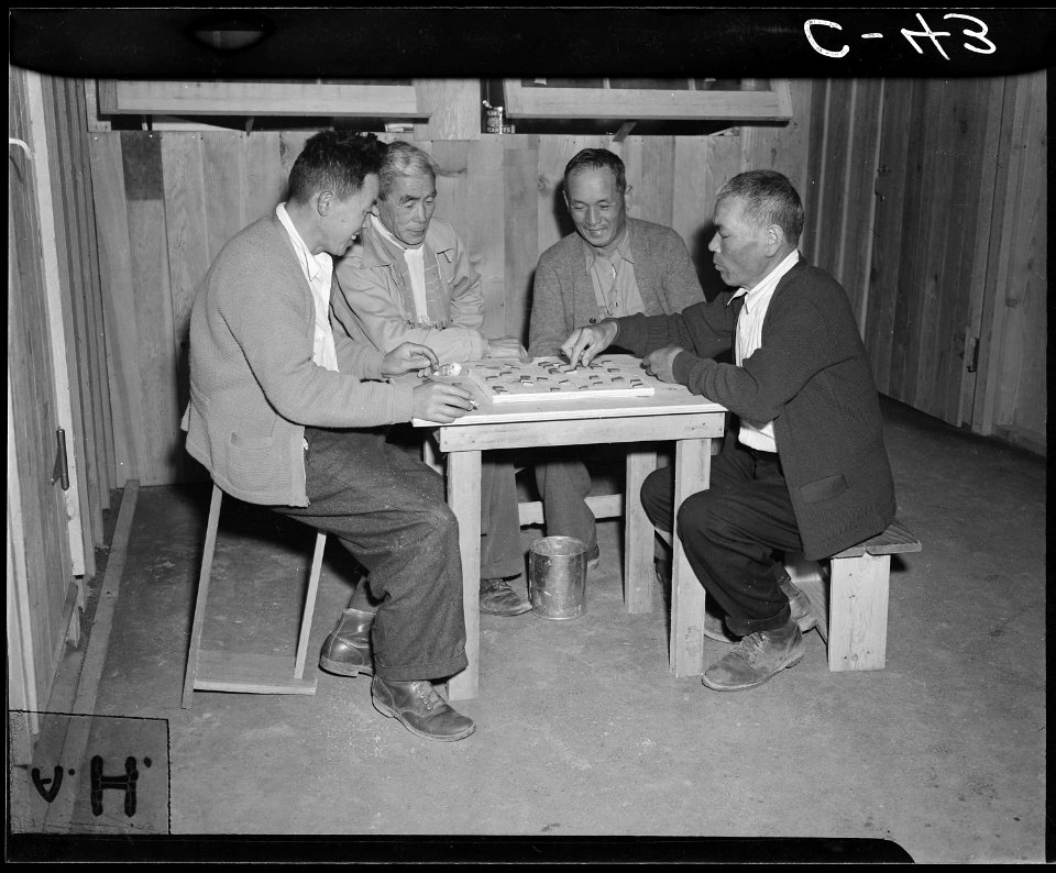 Manzanar Relocation Center, Manzanar, California. Playing Japanese checkers at this War Relocation . . . - NARA - 537421