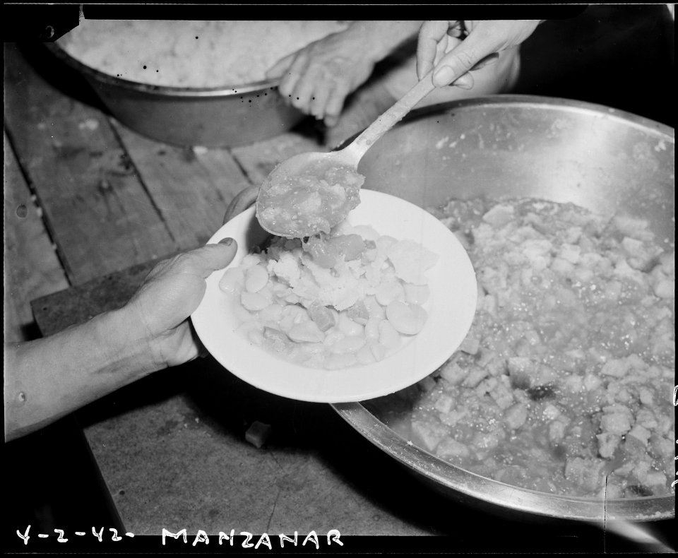 Manzanar Relocation Center, Manzanar, California. Meals are being served cafeteria style at this Wa . . . - NARA - 536862