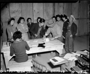 Manzanar Relocation Center, Manzanar, California. Registration for work at this War Relocation Auth . . . - NARA - 536880