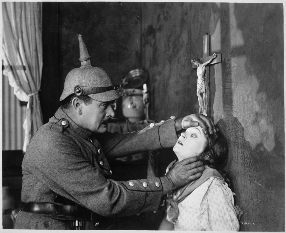 Mae Marsh, as a Belgian girl, and A. C. Gibbons as a German soldier, in Goldwyn's all-star Liberty Loan picture, Stake - NARA - 516486