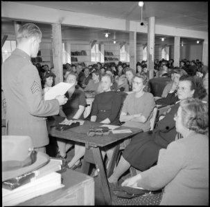 Manzanar Relocation Center, Manzanar, California. Sergeant Victor Tierman explaining the registrati . . . - NARA - 536718