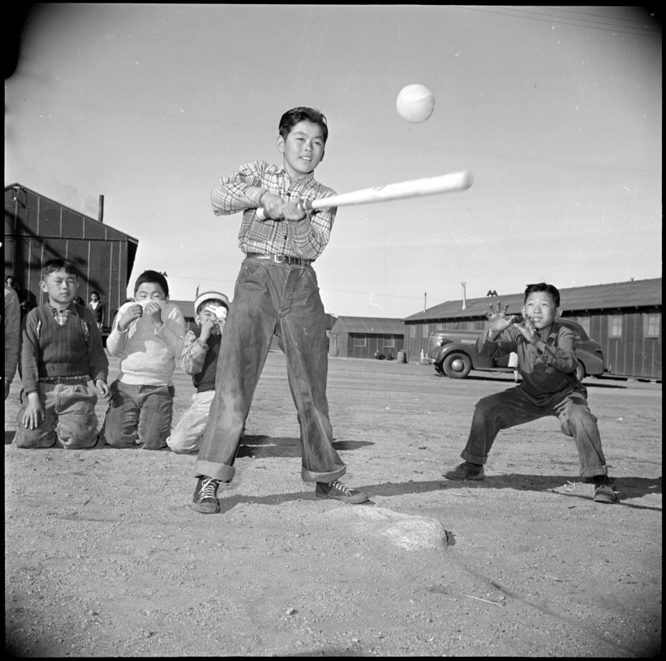 Manzanar Relocation Center, Manzanar, California. Sixth grade boys enjoy a game of soft ball at rec . . . - NARA - 536699