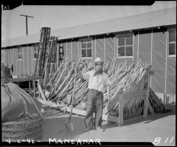 Manzanar Relocation Center, Manzanar, California. So that gardens and farmers may follow their call . . . - NARA - 536760