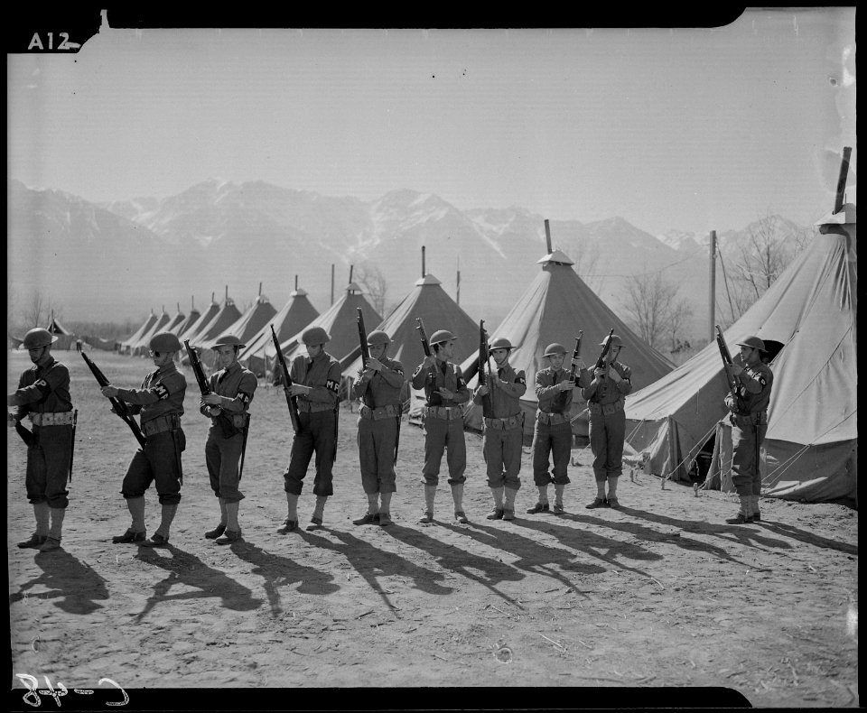 Manzanar, California. Military Police at assembly center for persons of Japanese ancestry evacuated . . . - NARA - 537423
