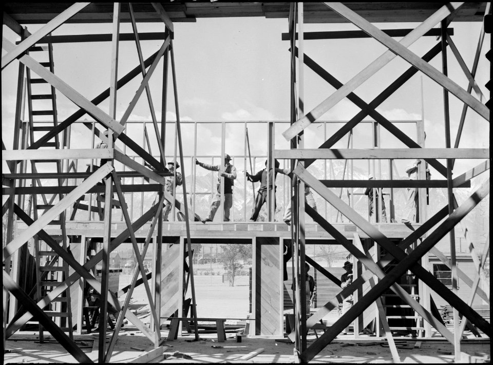 Manzanar Relocation Center, Manzanar, California. Workers on the Auditorium. - NARA - 539557