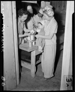 Manzanar Relocation Center, Manzanar, California. Special food formula are prepared for babies at M . . . - NARA - 536756