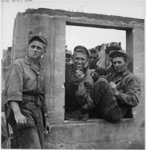 Marines pause at Agat during lull in battle for recapture of Guam. - NARA - 520970 photo