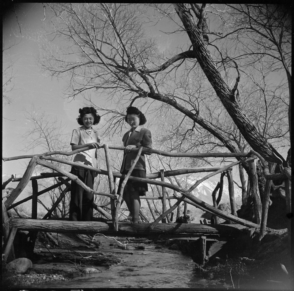 Manzanar Relocation Center, Manzanar, California. Toshiko Mikami and Kazuko Sakai, pretty Nisei gir . . . - NARA - 536939