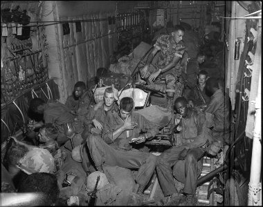 Members of the 101st Airborn Division shown aboard a USAF C-130 at Pham Thiet Air Base, Republic of Vietnam, for... - NARA - 542297