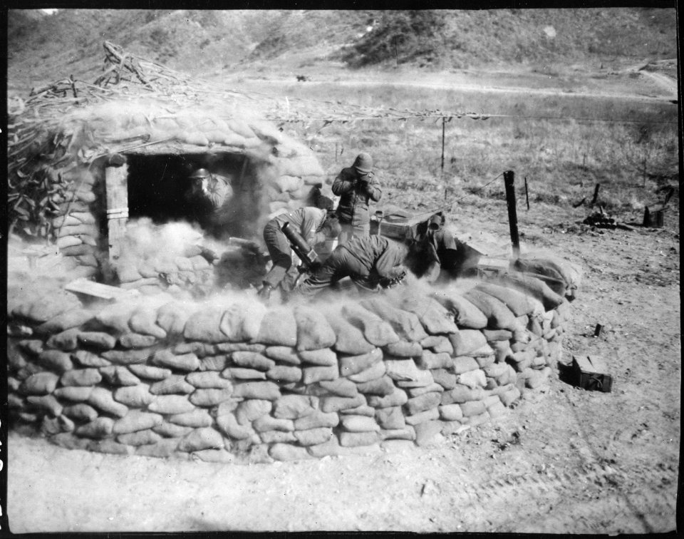 Men of the 4.2 mortar crew, 31st Heavy Mortar Company fire at enemy position, west of Chorwon, Korea. - NARA - 531429