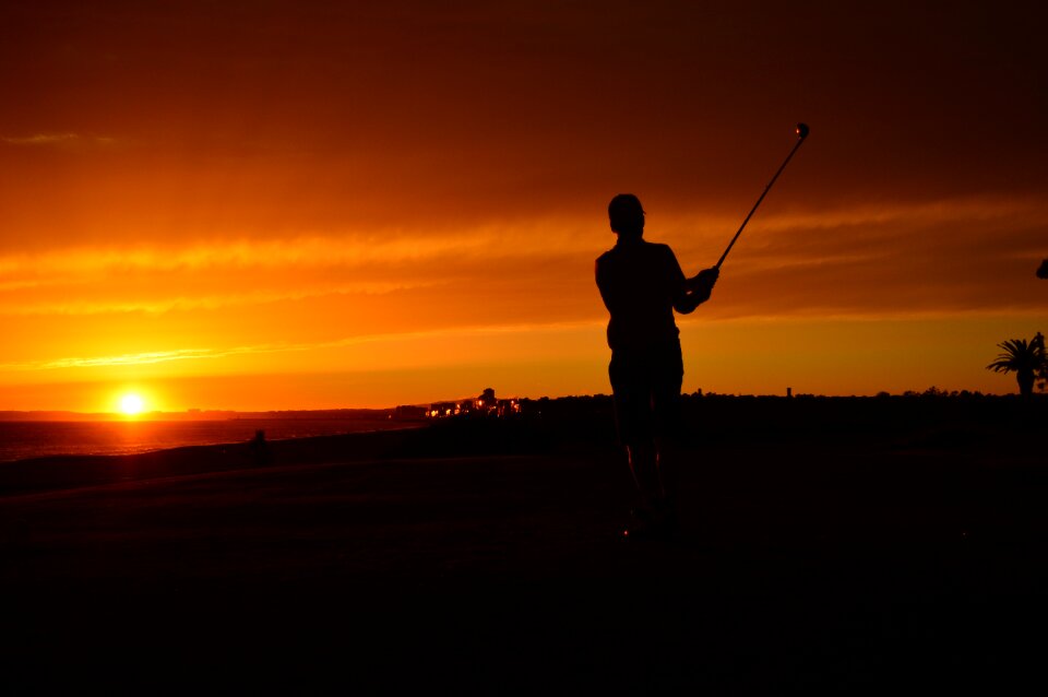 Dawn backlit golf