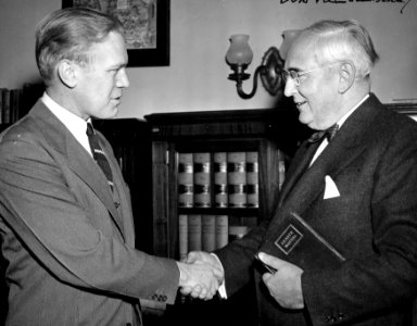 Michigan Senator Arthur Vandenberg welcomes Congressman Gerald R. Ford Jr. - NARA - 7064468 photo