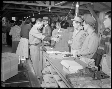 Minidoka Relocation Center. Community Store in block 30 - NARA - 536572