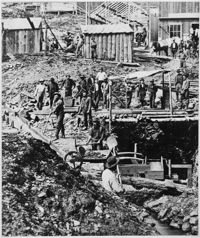 Mining crew drifting for gold below discovery point, Deadwood, Dak. Terr. Bystanders pose for photographer S. J. Morrow, - NARA - 533169